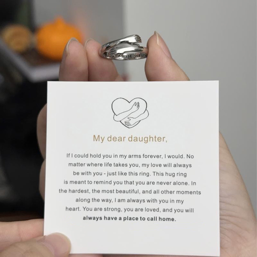 Hug ring pictured with a heartfelt daughter message card