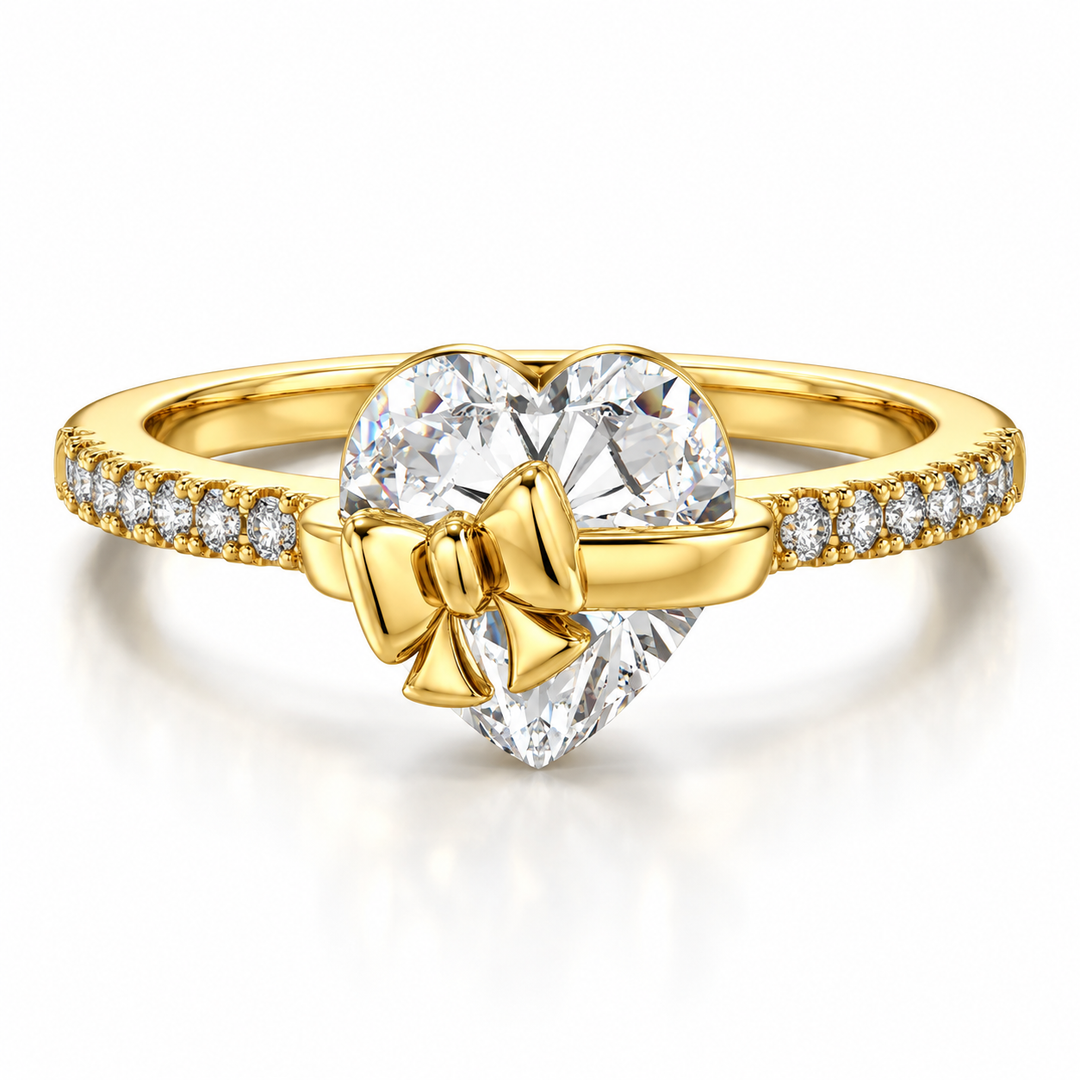 Gold Bow-Kissed Heart Ring with heart-shaped center stone and bow detail