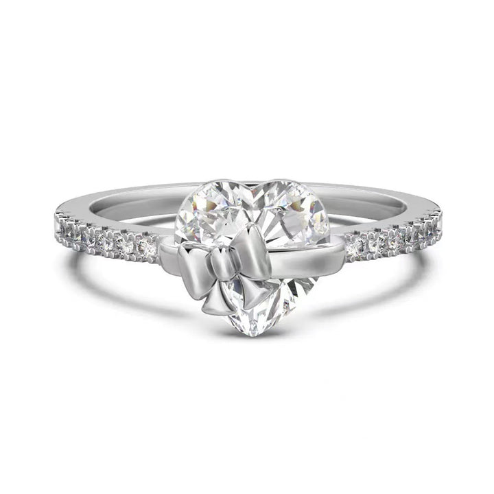 Silver Bow-Kissed Heart Ring with sparkling heart center and bow