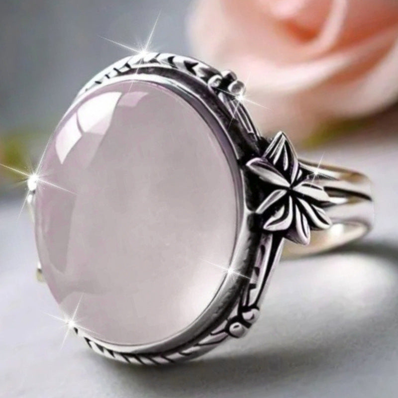 Close-up of oval moonstone floral ring