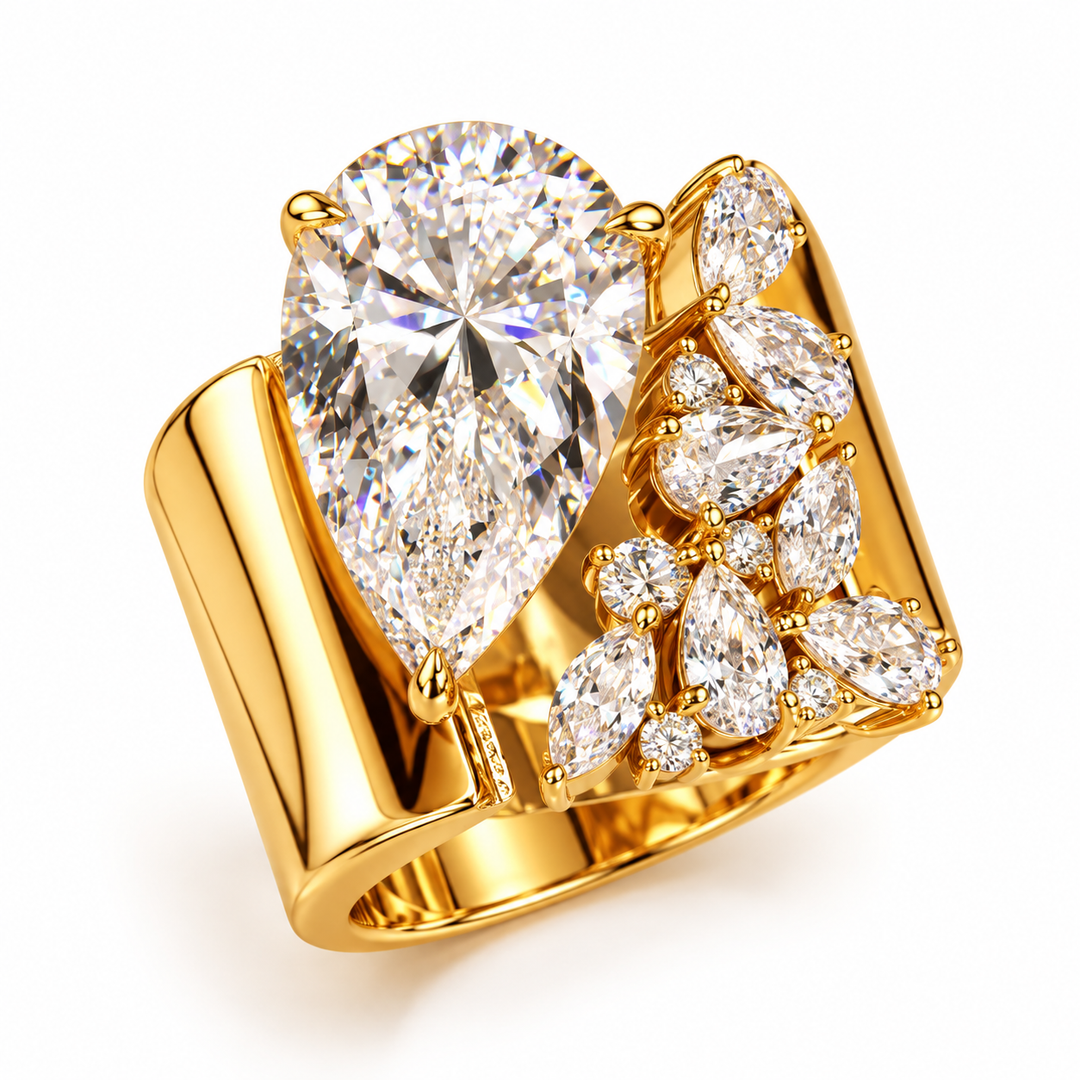 Gold pear-cut and floral cluster open ring on white background