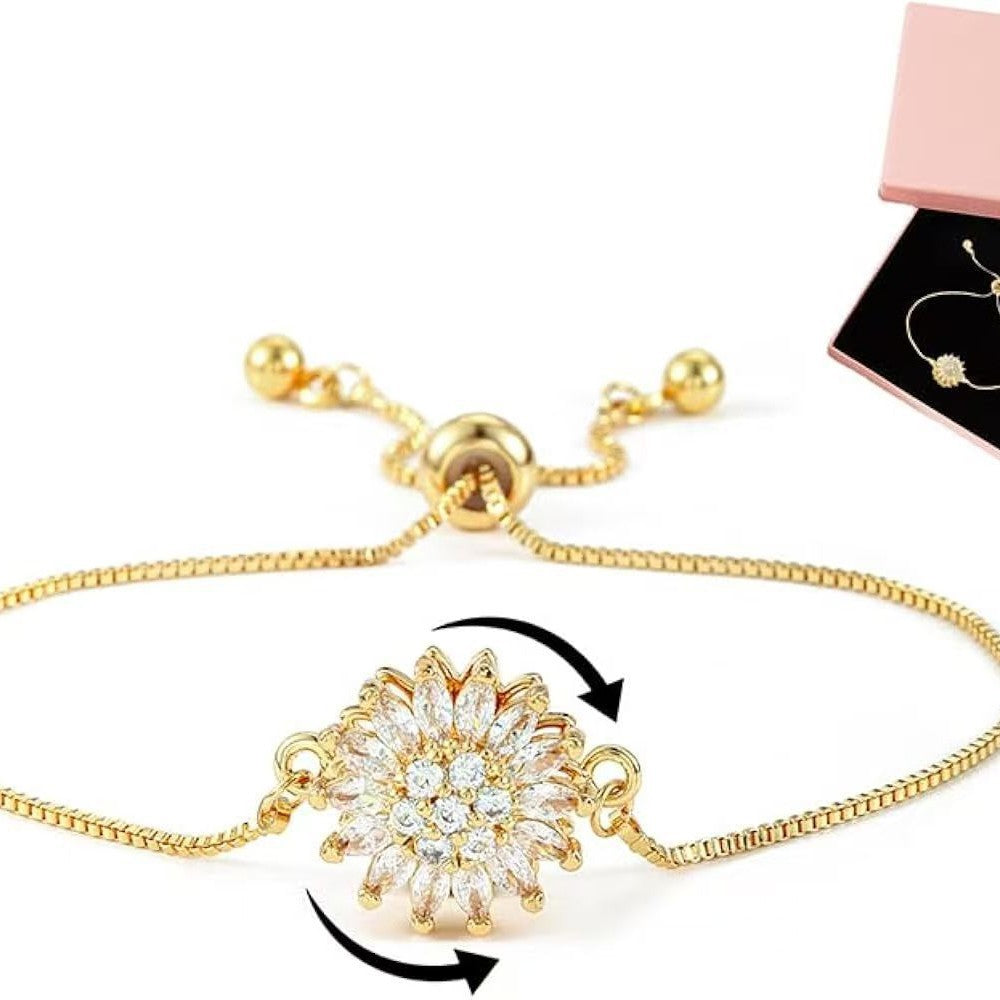 Sunflower bracelet detail with arrows illustrating the rotating floral centerpiece